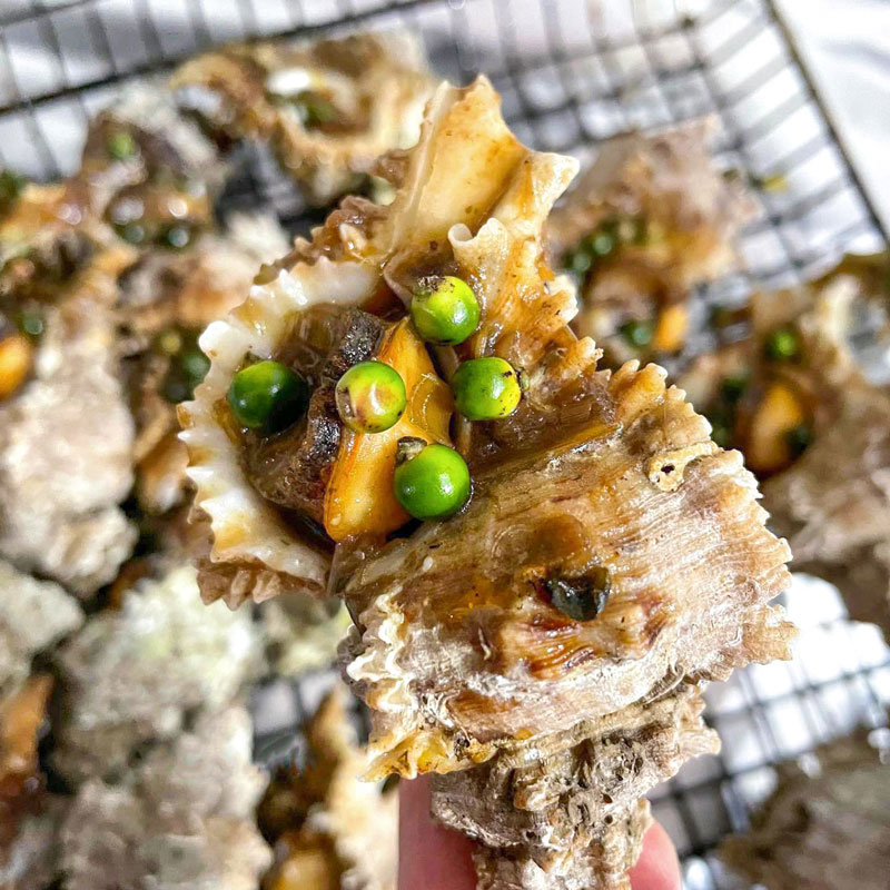 Chế biến ốc sư tử nướng tiêu xanh đúng cách